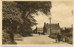 Man with yoke and buckets walking to the well in Docking Road.