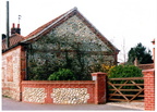 Barn used as a chapel by the Primitive Methodists up to 1892. Door and window blocked when it reverted to use by the landowner. Now garage of Southgate House.Photo 2005.